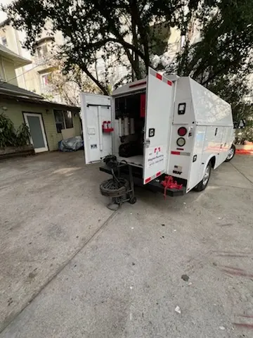 Magnet Plumbing service vehicle on-site for Water Heater Repair in Hialeah